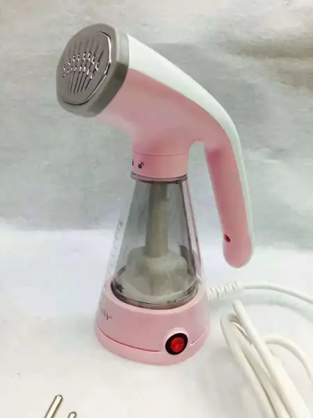 المكواة بالبخار في المنازل، مكواة محمولة صغيرة الحجم تعمل بالبخار المكواة بالبخار في المنازل، مكواة محمولة صغيرة الحجم تعمل بالبخار